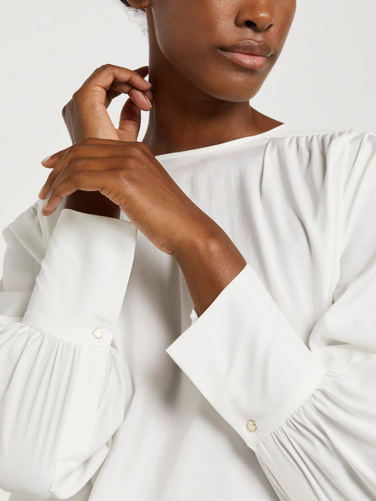 Blouse with deep pleat detail