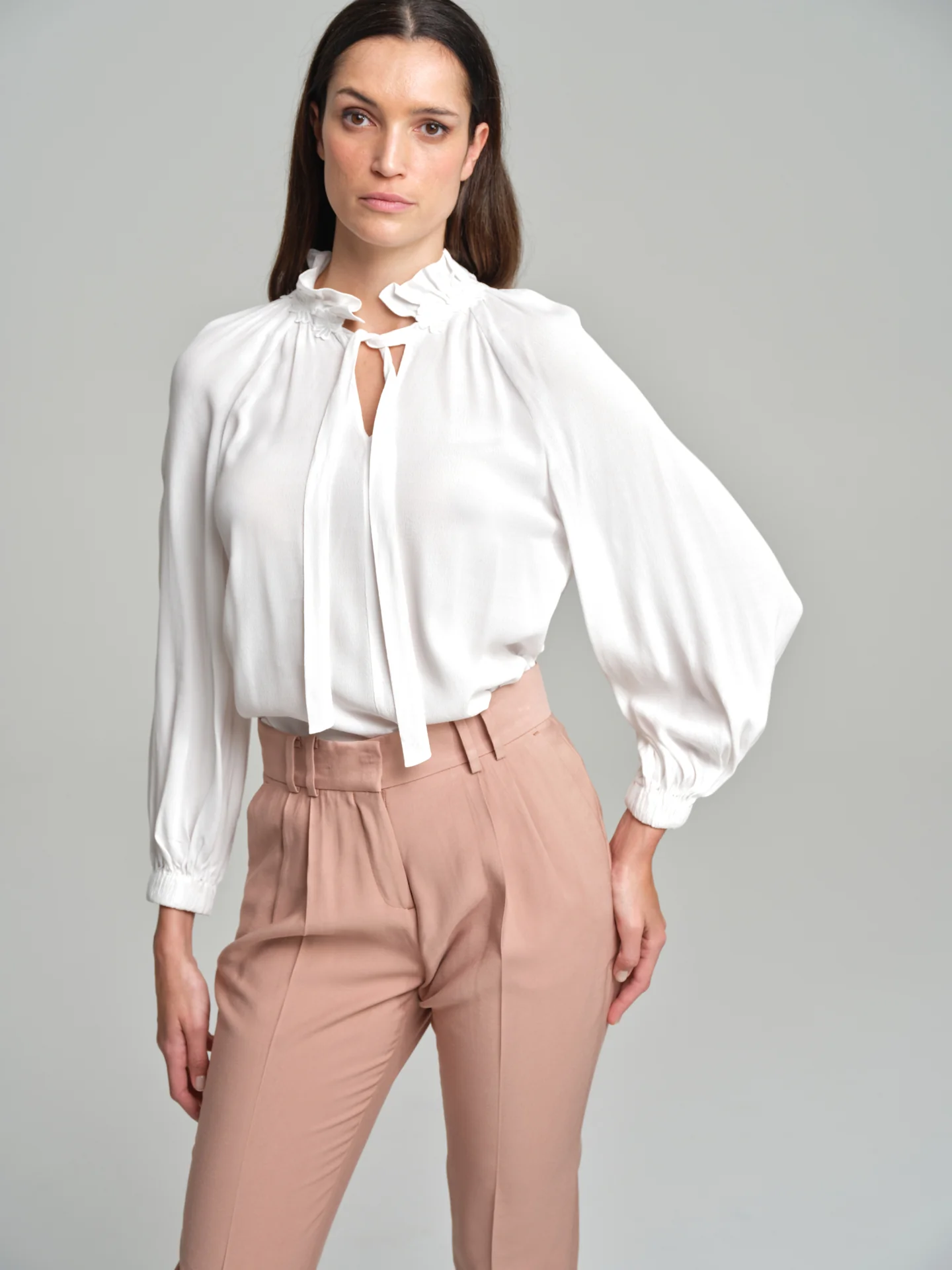 Blouse with flower apliqué on neckline