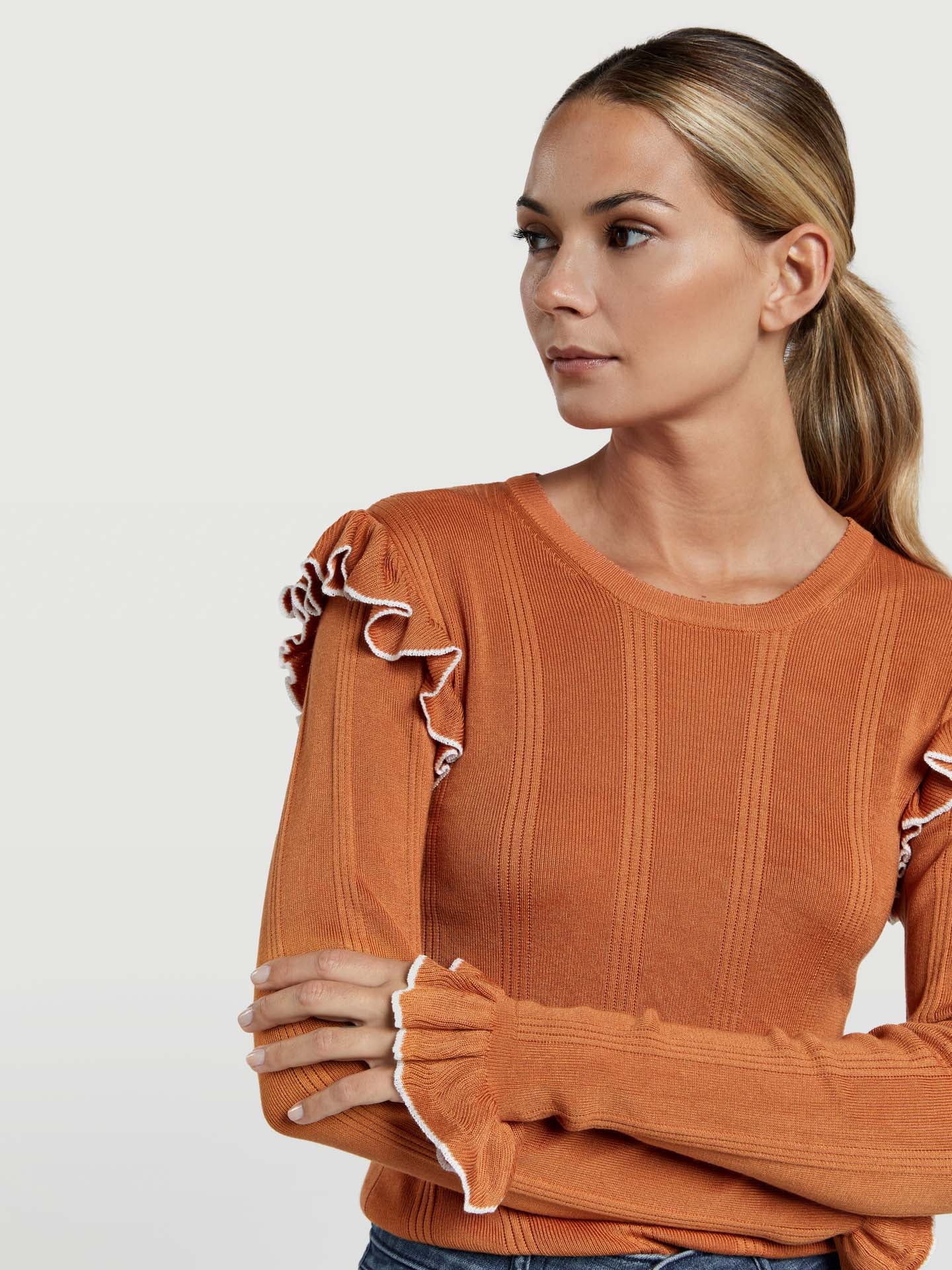 Sweater with ruffle details